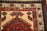 Reciprocating pawn and geometric blossom borders on a vintage Persian Serab runner.