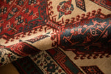A soft fold in the vintage Serab runner reveals the dense texture of its short wool pile.