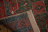 Detail of the restored side selvage and hand-knotted back on a vintage Karaja rug runner.
