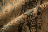 A soft fold in the distressed Bakhtiari carpet reveals its even, low-pile textural patina.