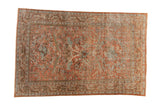 Vintage distressed Mahal rug with an allover arabesque pattern in dusty blush, slate blue, and olive green.
