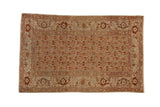 Vintage Persian Malayer rug with repeating boteh motifs and a turtle border in muted apricot and charcoal.