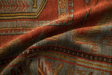 Softly draped vintage Persian runner showing its even, low pile texture in brick red and slate blue.