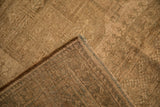 The hand-knotted foundation and secured side selvage of a vintage Ersari carpet.