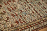 Intricate serpent-scrolled main border and geometric field of an antique Borchalou Persian runner.