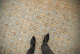 Soft cotton pile of a distressed Agra carpet showing the allover Herati motif in powder blue and gold.