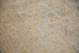 Short, even pile of a distressed Agra carpet with powder blue and lemon gold Herati motifs.