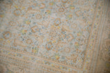 A close view of the distressed Herati motif and short cotton pile.