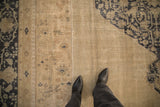Close view of the distressed vintage Oushak's mostly even wear down to the foundation.