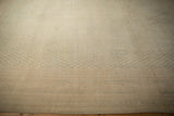 Low, distressed pile of a vintage Mir Sarouk carpet showing mostly even wear and faint boteh motifs.