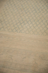 Reverse view of the vintage Persian Sarouk showing its hand-knotted ivory foundation.