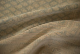 Texture detail of a distressed Mir Sarouk rug showing the even wear across its soft, low pile.