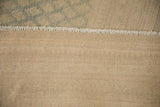The tightly woven foundation on the back of the hand-knotted Persian Mir Sarouk carpet.