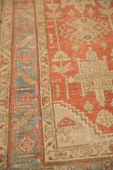 Serrate leaf border in powder blue next to the distressed, low-pile terracotta field.