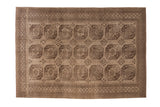 Vintage distressed Ersari carpet with repeating geometric guls in a monochromatic silver and charcoal palette.