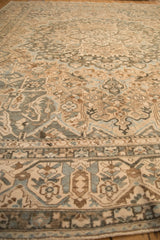 Low angle perspective across a vintage Bakhtiari carpet highlighting its even, textural low pile.