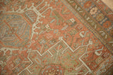 Mostly even wear to the knot heads on a vintage Karaja rug with geometric patterns.