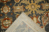 Folded corner of a vintage Malayer rug showing the tightly woven foundation and intact side selvage.