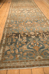 A long perspective view down the vintage Malayer runner highlighting the dusty teal and copper abrashes.