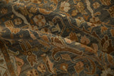 Even wear across the knot heads of a distressed Malayer rug with scrolling copper and platinum botanicals.