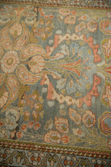 Low pile texture of the distressed Mehreban rug, showing mostly even wear to the knot heads.