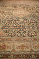 Angled view of the distressed Sivas carpet's textured pile and saffron-accented Herati design.