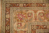 Corner detail of a distressed Sivas carpet showing the floral spandrel and intricate borders.