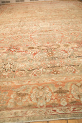 Angled perspective highlighting the even wear across the knot heads of the vintage carpet.