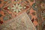 Corner view of a vintage Lilihan rug showing its blush pile and hand-knotted foundation.