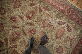 Detailed texture of a vintage Sivas carpet with mostly even wear over its lotus flower and palmette design.
