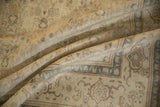 Softly draped vintage Kayseri carpet showing its distressed texture and mostly even low pile.