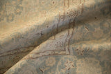 Soft, low pile texture of a vintage Kashan with a detailed coffee brown arabesque border.