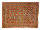Distressed Persian Mahal carpet with sprawling palmettes in time-softened madder red, silver, and pale blue.