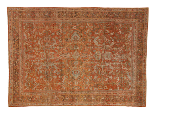 Vintage distressed Mahal carpet with a shadow medallion and floral vinery in madder red, silver, and pale blue.