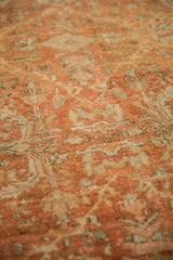Time-softened texture of a distressed Mahal carpet showing mostly even, low-pile wear.