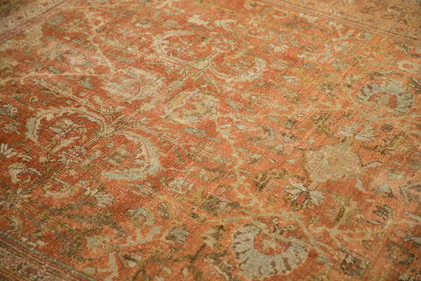 Close view of the hand-knotted pile worn to the foundation on a vintage Mahal carpet.