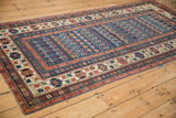 Antique Caucasian rug's crab style main border, minor floral patterns, and subtle even wear.