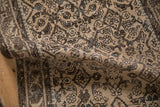 Distressed beige and charcoal Herati pattern on the vintage Hamadan runner pile.