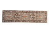 Vintage distressed Bakhtiari runner with charcoal, tangerine, oxidized silver, cobalt blue patterns, 2'8