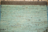Soft, plush abrash pile with powder blue and silver striations, showing intact selvage.