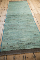 Soft, plush, hand-knotted pile in abrashed powder blue with blue side selvage.