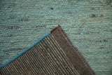 Pakistani Moroccan runner's hand-knotted back weave, blue selvage, and plush aqua pile.