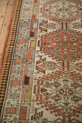 Distressed Persian Serab runner's geometric border with reciprocating pawn motif, madder red and green.