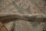 Distressed vintage Hamadan runner texture with even wear, muted pale blush and seafoam tones.
