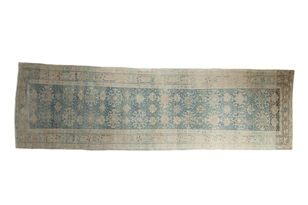 Distressed Bijar runner with faded pale blue, ivory floral guls, and soft worn pile, 3'7" x 11'9".
