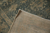 Hand-knotted foundation, side selvage, and distressed blue and beige pile of the Bijar runner.