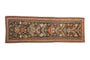 Antique Soumac runner featuring sprawling floral palmettes and dragon-like motifs in chocolate, red, and sapphire.