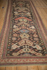 Antique Soumac runner, with tomato red and beige geometric border, chocolate field motifs.