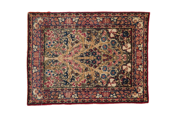 Antique Kerman tree of life rug: cochineal red, navy floral pattern, 2'1" x 2'9".