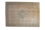 Distressed Persian Tabriz carpet, central floral medallion, ivory and dusty blue, 9x12'.
